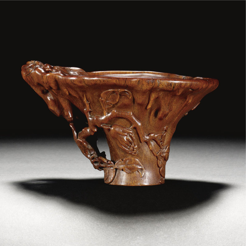 A rhinoceros horn 'Buddha's hand' libation cup, Qing dynasty, Kangxi period (1662-1722)
