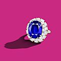 A 21.30 carats ceylon sapphire and diamond cluster ring