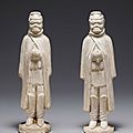A pair of straw-glazed pottery figures of turko-mongolian attendants, sui-early tang dynasty, 6th-7th century