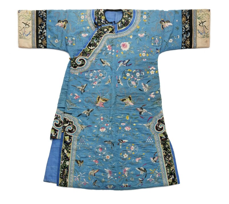 A midnight-blue-ground silk lady's informal three-quarter-length robe ...