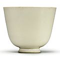 A glazed white stoneware cup, Sui-Early Tang Dynasty, 7th century