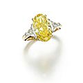 Fancy intense yellow diamond ring
