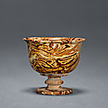 A marble-glazed stem cup, tang dynasty (618-907)