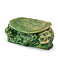 An inscribed cizhou green-glazed 'lion' pillow, song dynasty (960-1279)