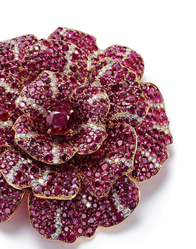 An elegant ruby and diamond 'Camellia' brooch, by Chanel - Alain.R